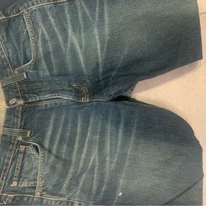 Distressed bootcut jeans